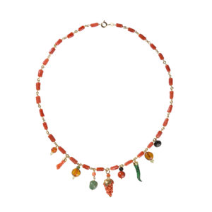 Natural coral necklace in yellow gold plated silver with charms