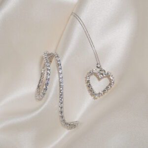 Collana con cuore di brillanti e bracciale tennis con brillanti